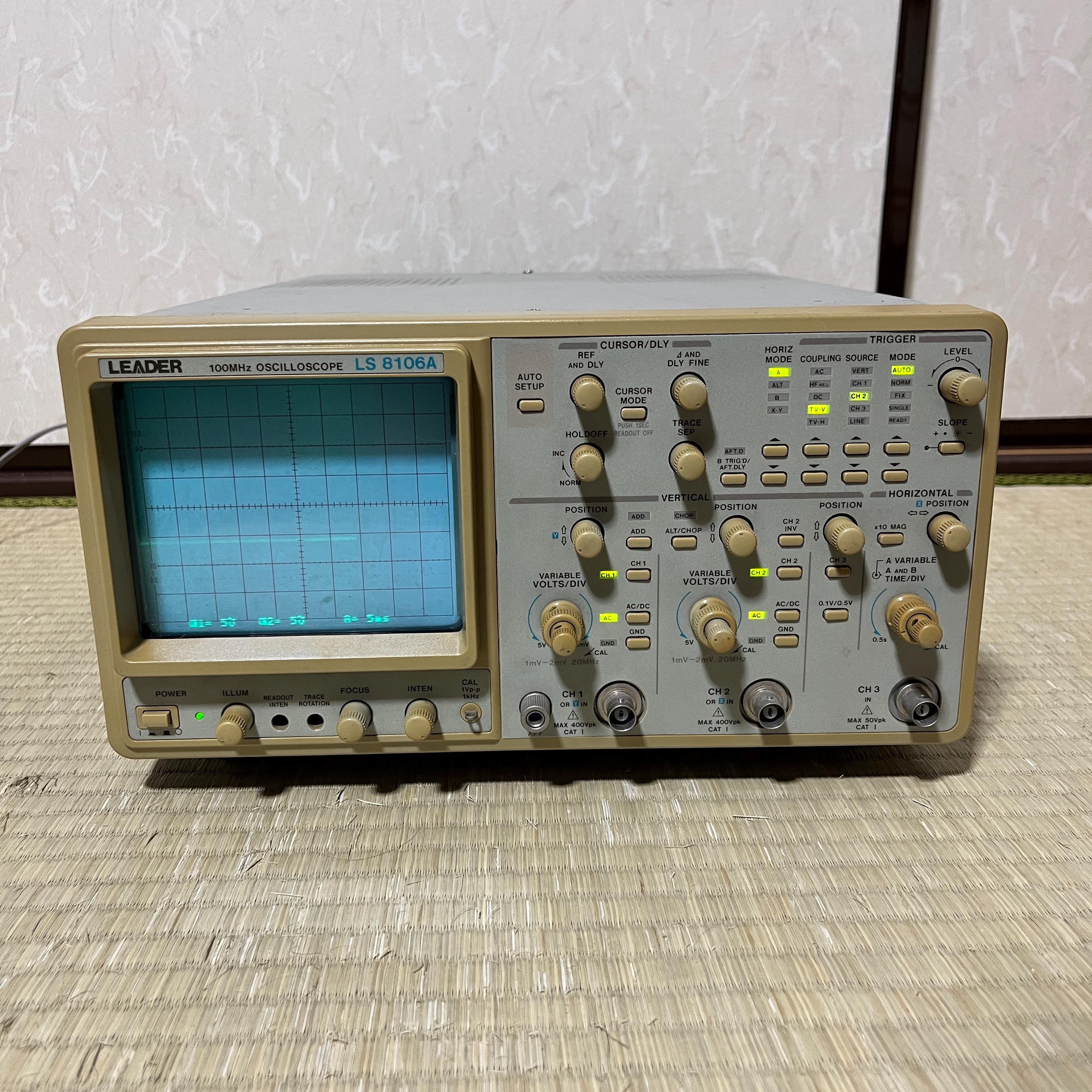 Leader LS-8106A 100MHz 3-Channel Analog Oscilloscope – CRT Display, Auto-Setup, Vintage Lab Equipment
